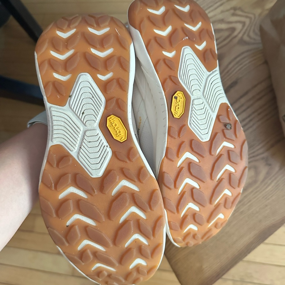 Hoka Trail Shoes with Gum Brown Outsoles and White Upper Accents